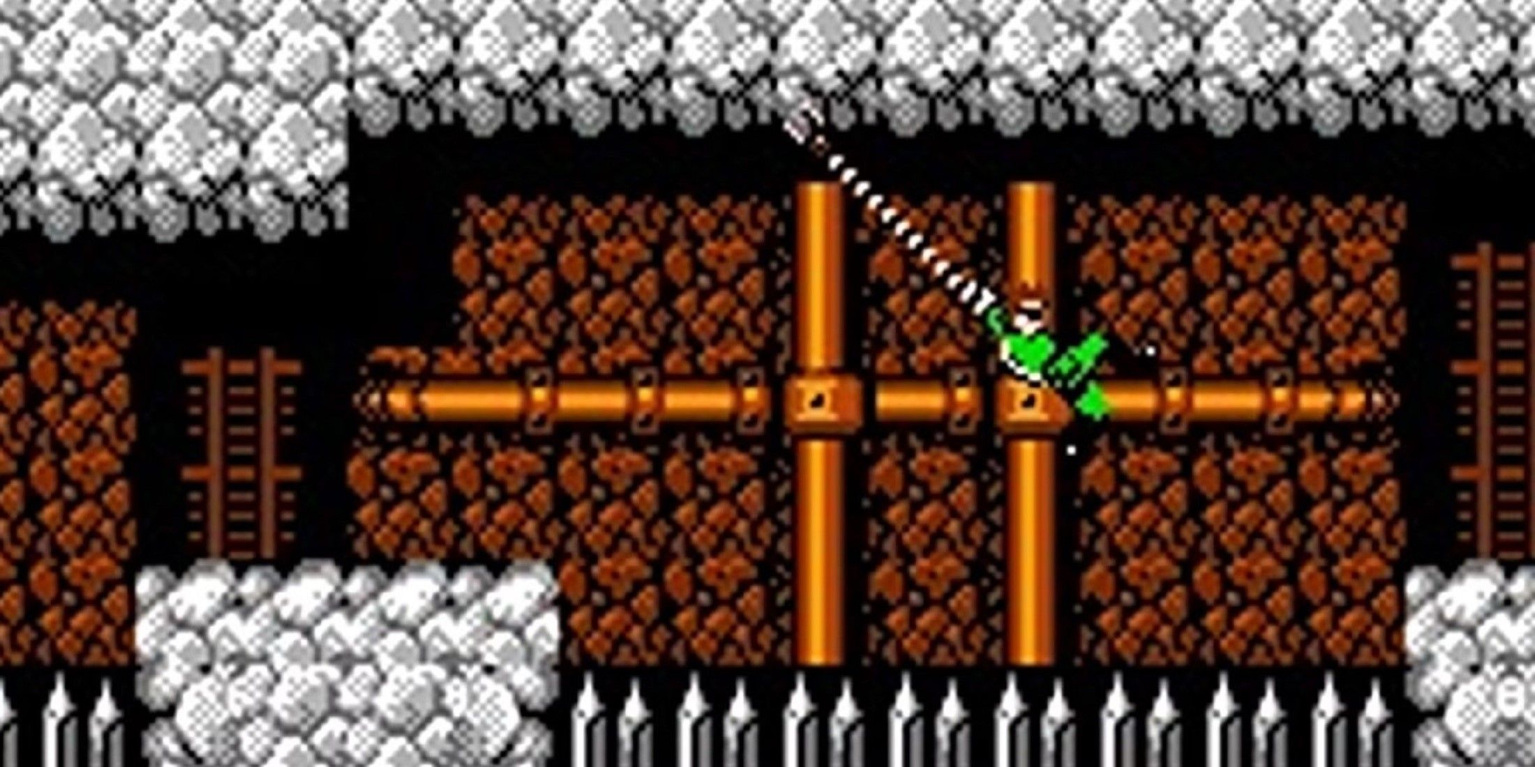 bionic commando character swinging through tunnels.-1