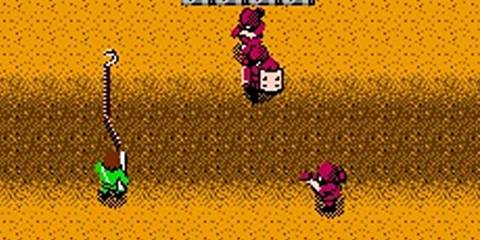 bionic commando shooting at an enemy.-1