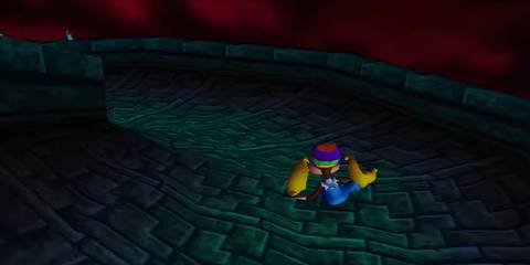 Tiny Kong going down a slide in Donkey Kong 64