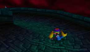 Tiny Kong going down a slide in Donkey Kong 64