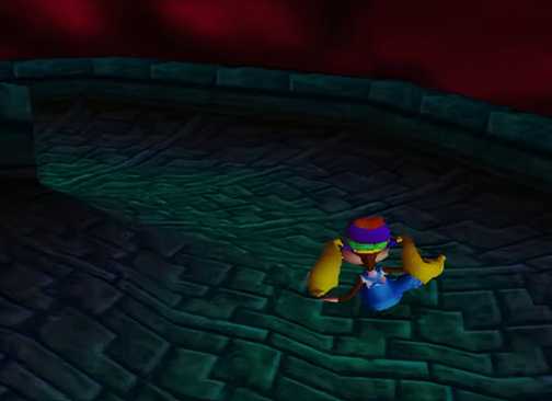Tiny Kong going down a slide in Donkey Kong 64