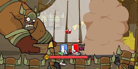 Fighting a boss in Castle Crashers
