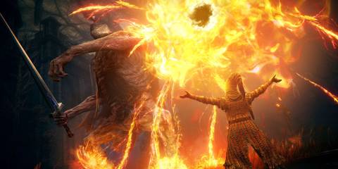 Fighting a giant boss with a fire spell - Elden Ring