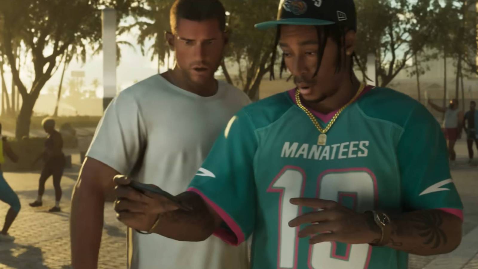 Jason and another guy reacting to something on a phone in a Grand Theft Auto 6 trailer