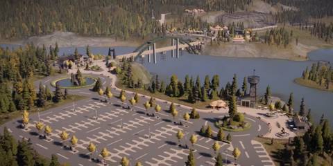 Jurassic World Evolution 2 car park with bridge to enclosures