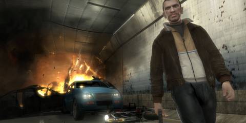 Nico walking away from a burning car in Grand Theft Auto 4 (PS3)