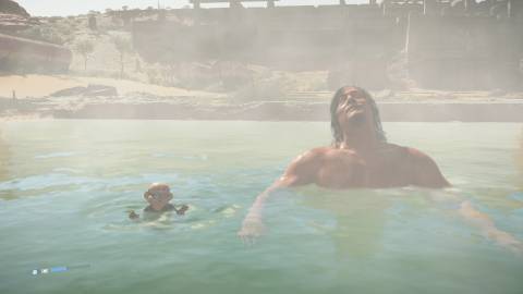 sam and dollman in a hot spring