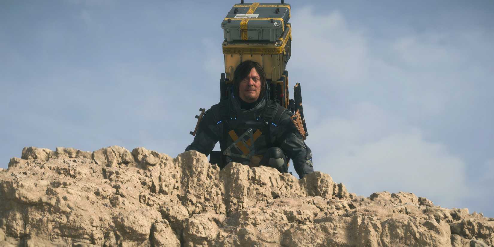 Sam on a cliff in Death Stranding 2 On the Beach
