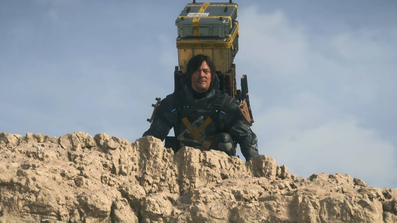 Sam on a cliff in Death Stranding 2 On the Beach