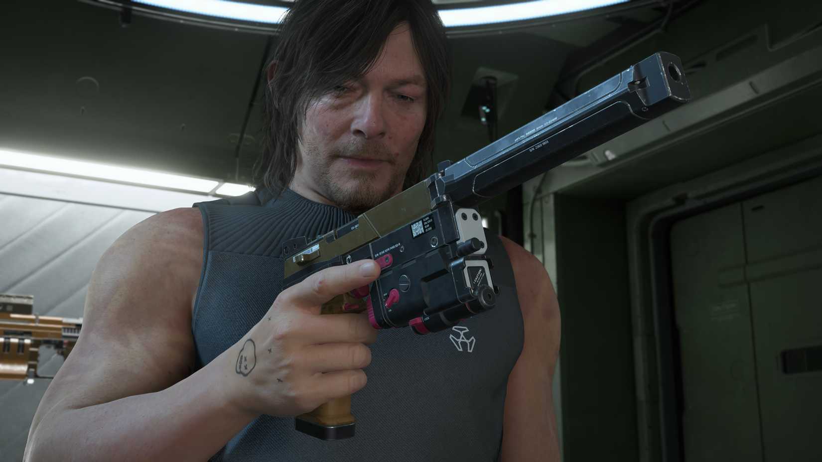 sam with a silenced pistol