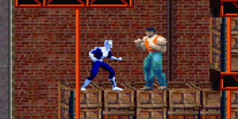 Spider-Armor Spider-Man fighting a thug in Spider-Man: Mysterio's Menace