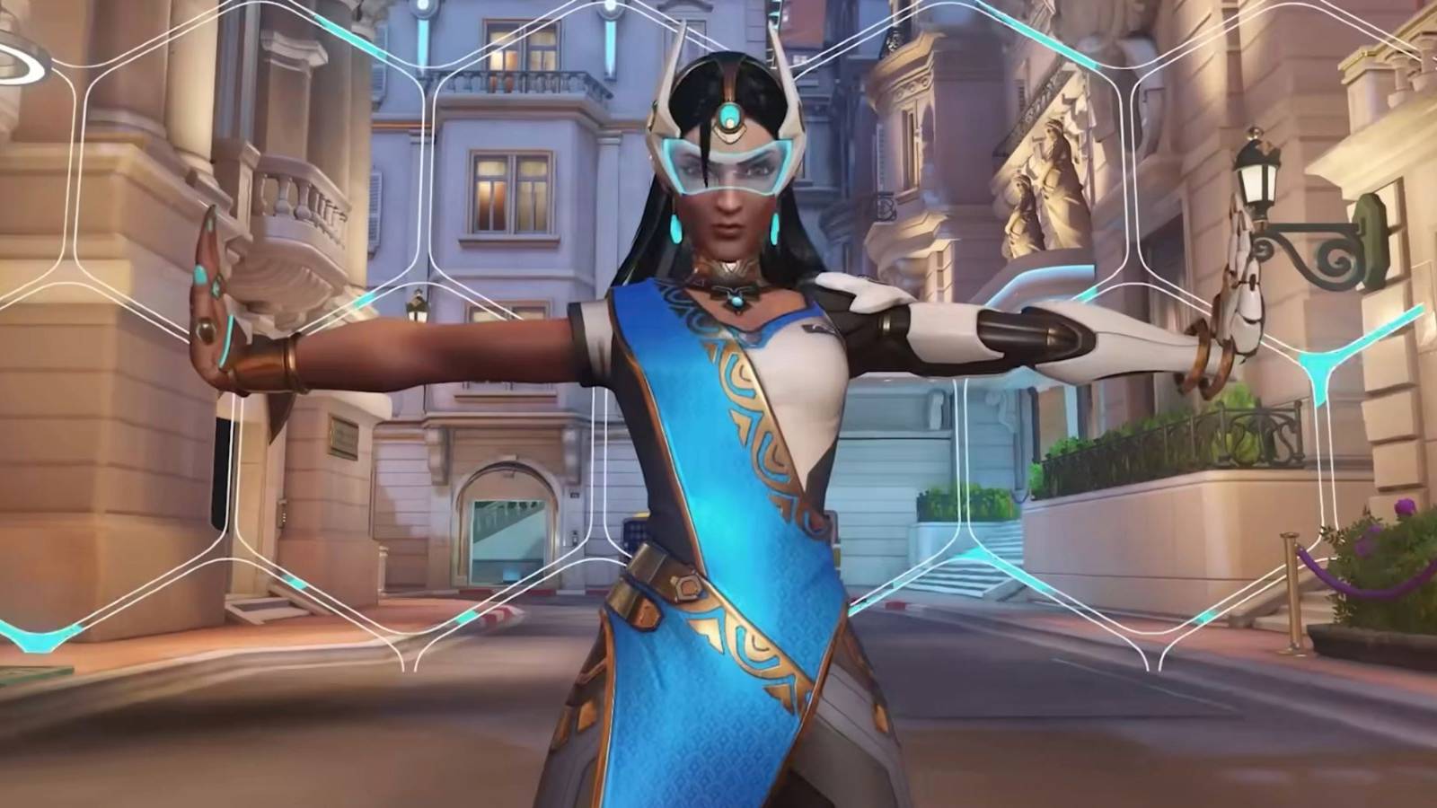 Symmetra from Overwatch standing in a city with her arms outstretched