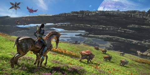 A Na'vi on the back of a creatures watching other animals in Avatar: Frontiers of Pandora