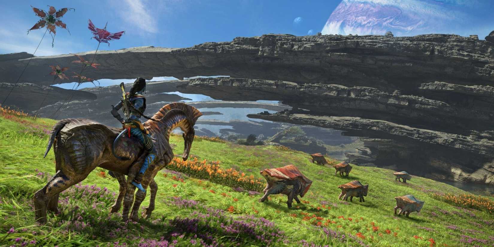 A Na'vi on the back of a creatures watching other animals in Avatar: Frontiers of Pandora