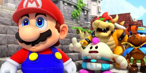Mario and friends looking at something offscreen in shock in Super Mario RPG