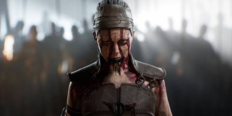 A close-up of Senua's face - Senua's Saga Hellblade 2