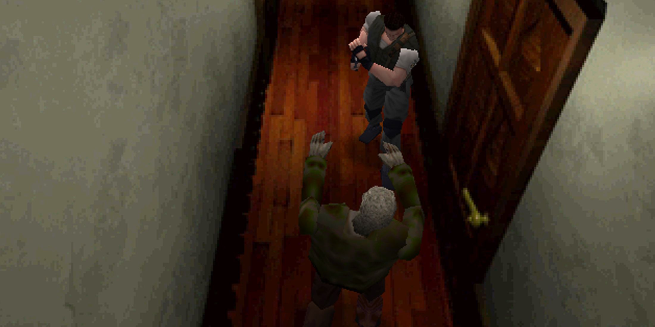 Chris fighting a zombie in a corridor - Resident Evil