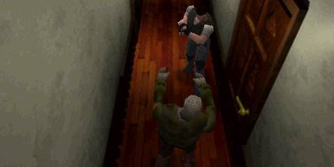 Chris fighting a zombie in a corridor - Resident Evil