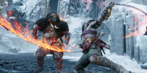 Kratos fighting an enemy with his blades - God Of War Ragnarok