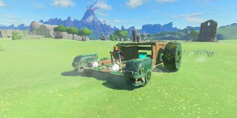 Link driving a vehicle around the open world - The Legend of Zelda Tears of the Kingdom