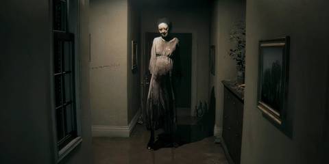 Lisa standing in a hallway