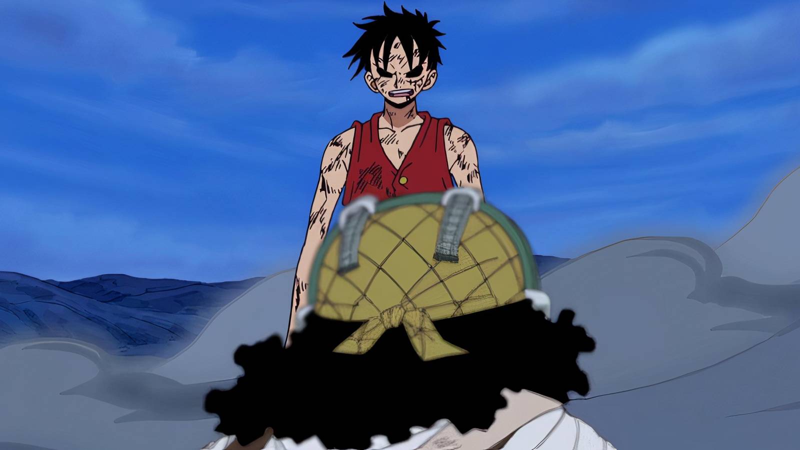 Luffy standing over Usopp