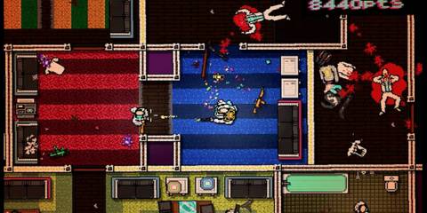 Shooting enemies with a shotgun in Hotline Miami