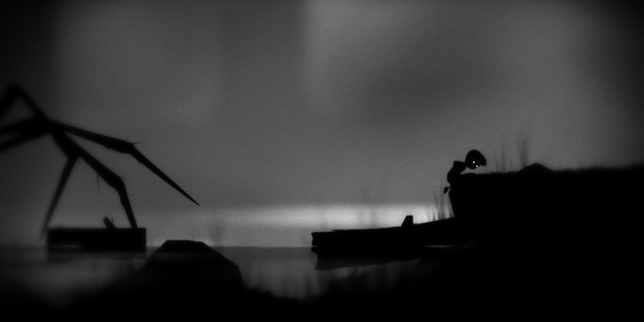 The boy running from the giant spider - Limbo