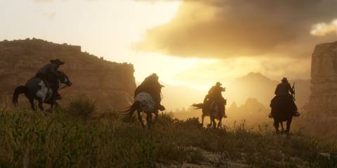 The gang escaping on horseback - Red Dead Redemption 2