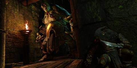 A player hiding behind a wall from an Ogre in Styx: Master of Shadows