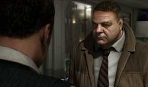 A detective speaking with another man in Heavy Rain