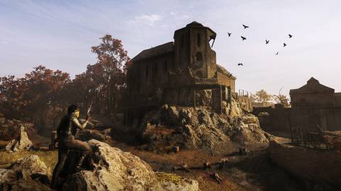 A man holding a revolver in front of a cathedral in Hunt Showdown