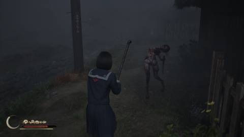 Attacking a doll enemy outside in Silent Hill f