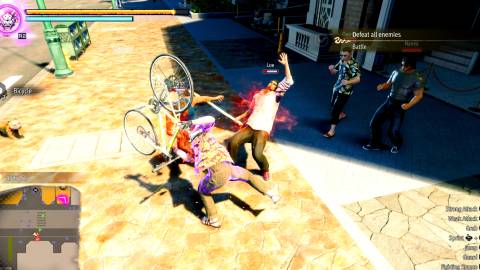 Attacking enemies with a bike in Like a Dragon Pirate Yakuza in Hawaii
