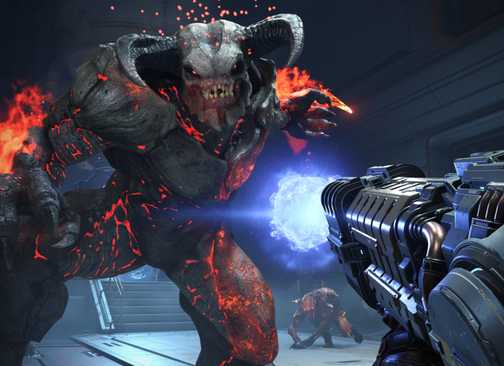Fighting a giant demon in doom eternal