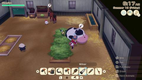 Milking a cow in Story of Seasons Grand Bazaar