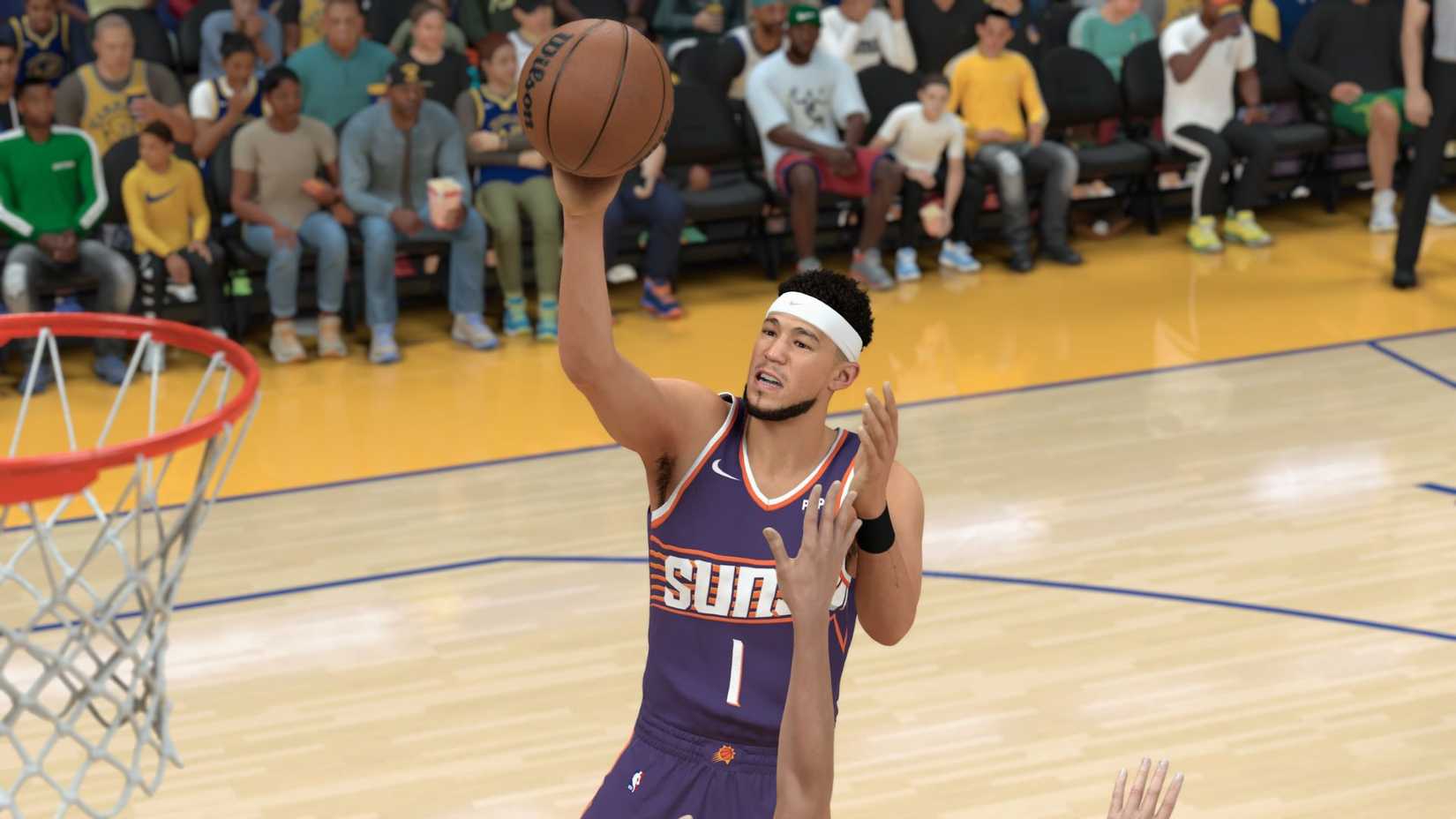Devin Booker going for a layup in NBA 2K26