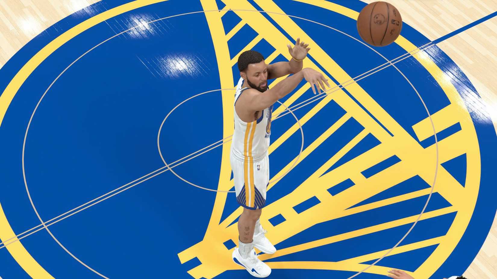 Steph Curry shooting the basketball in NBA 2K26