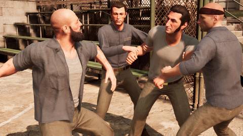 Leo being grabbed by prison inmates