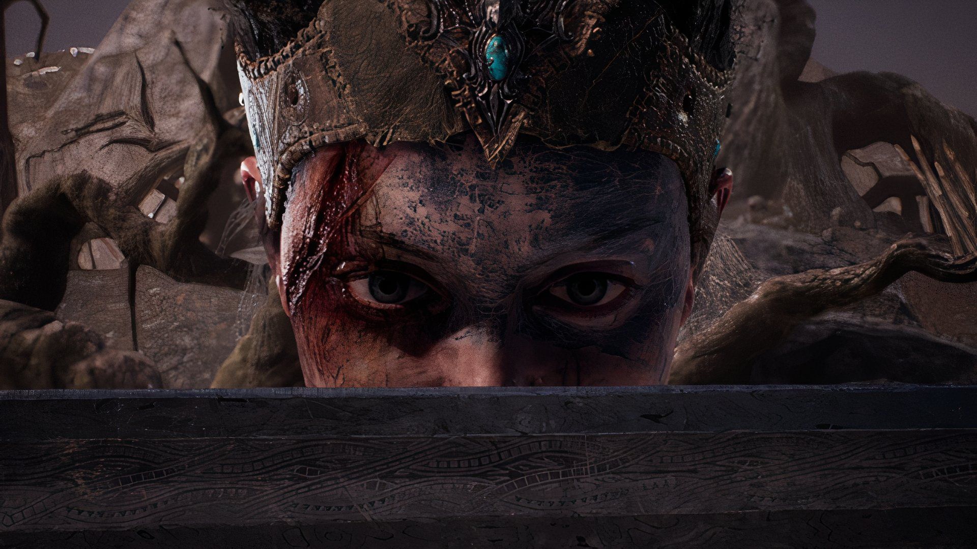 Senua with a sword in front of her face