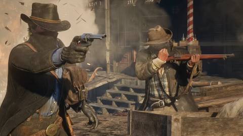 John and another cowboy shooting in a town