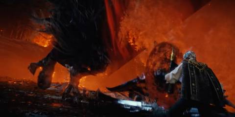 The main playable character facing a giant boss - The Duskbloods