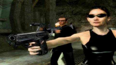 Trinity pointing a gun in Matrix Path of Neo