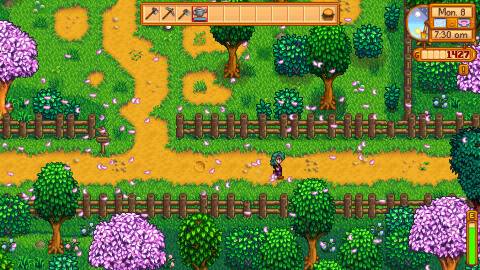 Walking down a road in Stardew Valley