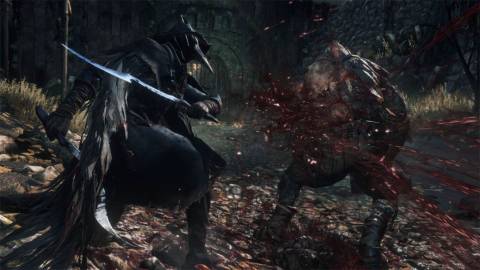A hunter fighting a monster - Bloodborne