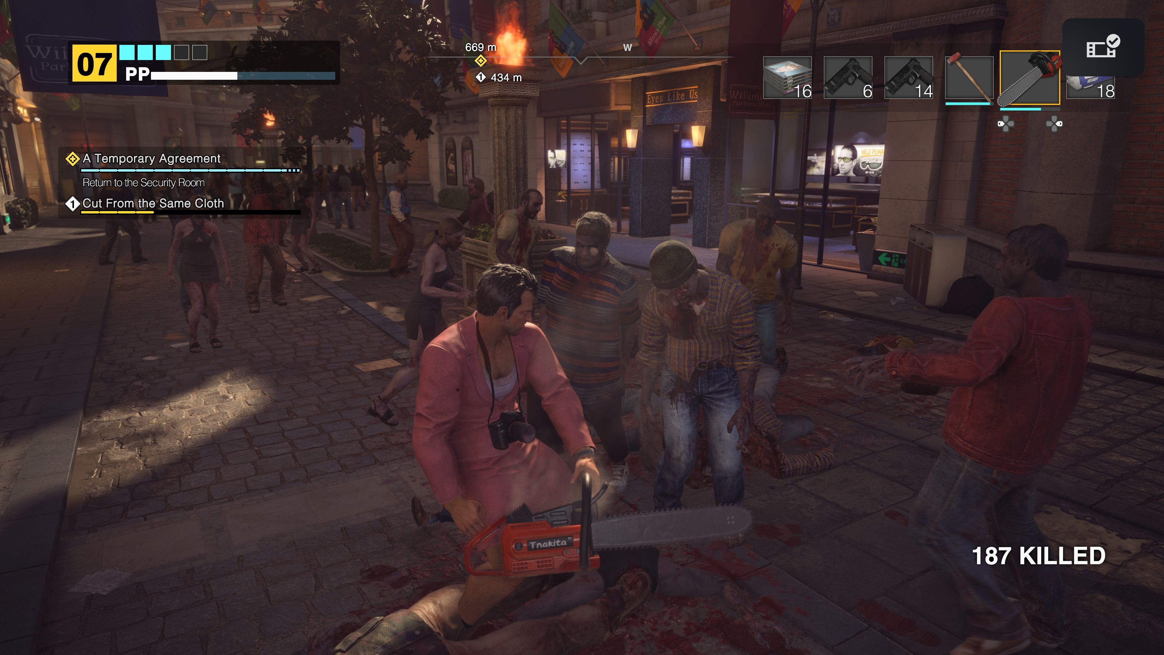 Chainsawing zombies in Dead Rising Deluxe Remaster
