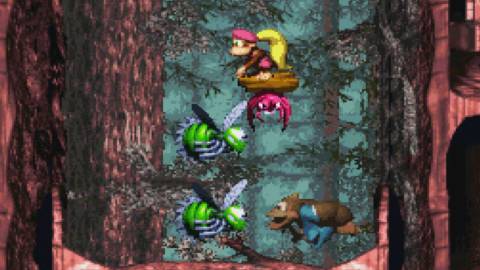 Dixie and Kiddy avoiding some enemies - Donkey Kong Country