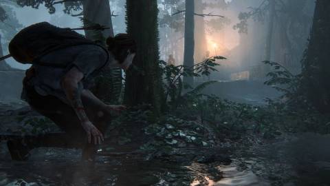 Ellie sneaking around some enemies - The Last Of Us Part 2