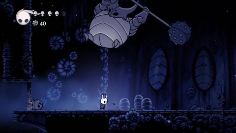 Fighting a boss in Hollow Knight