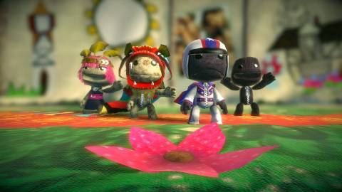 Four Sackboy characters in LittleBigPlanet 2